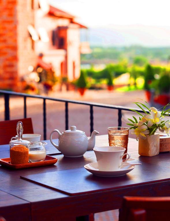 Toscana Town Square Suites Muszi Kültér fotó