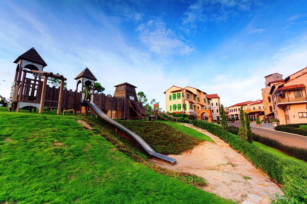 Toscana Town Square Suites Muszi Kültér fotó