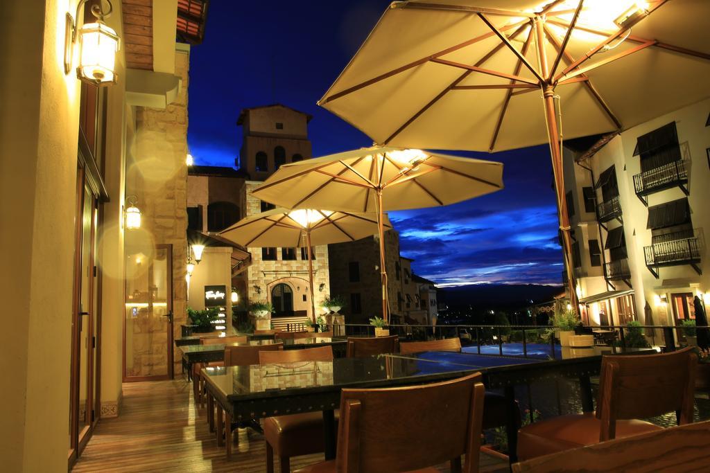 Toscana Town Square Suites Muszi Kültér fotó