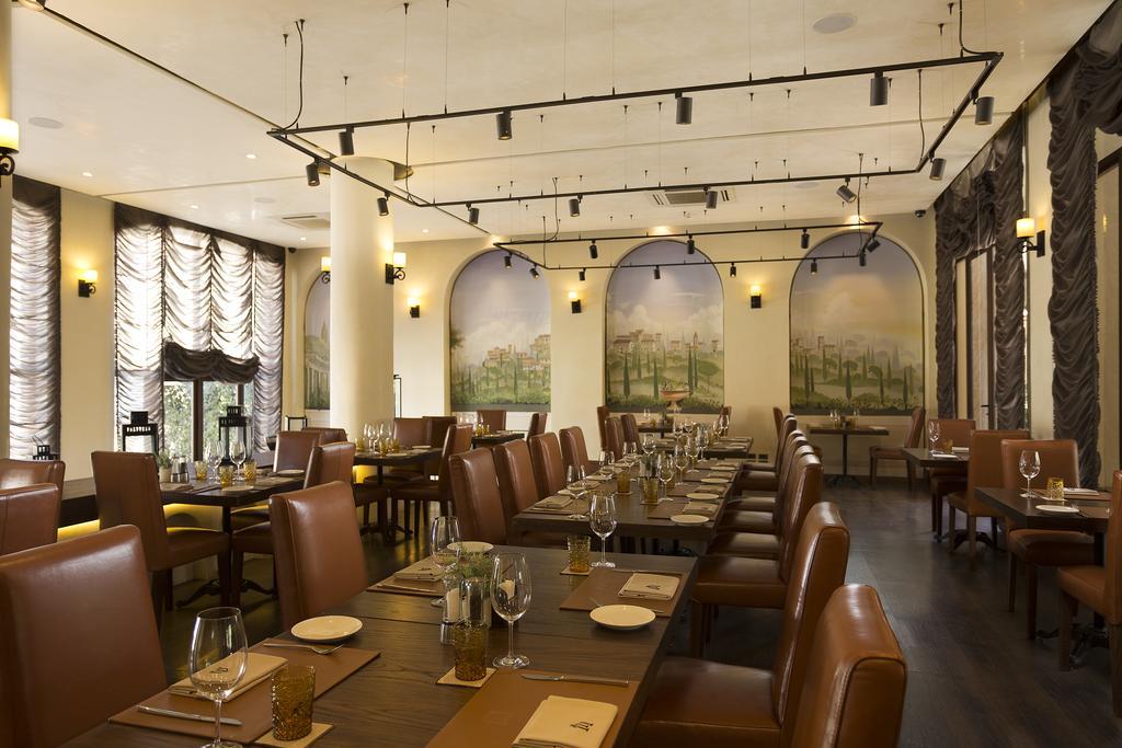Toscana Town Square Suites Muszi Kültér fotó