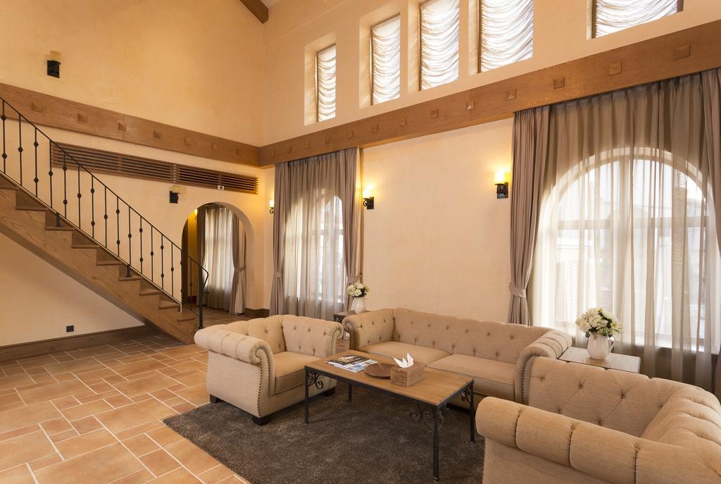 Toscana Town Square Suites Muszi Kültér fotó