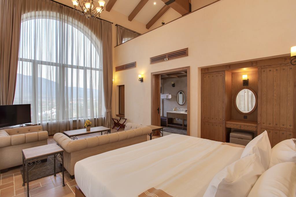 Toscana Town Square Suites Muszi Kültér fotó